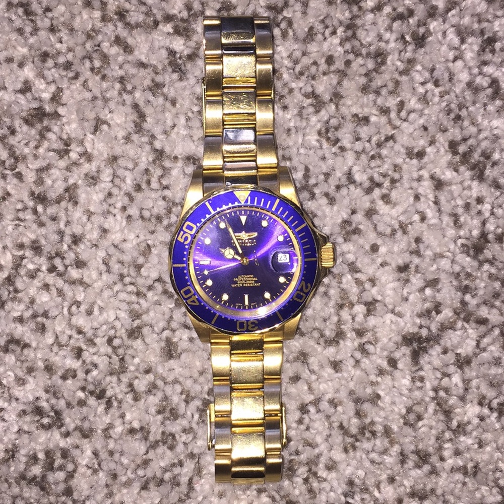 Invicta Gold watch/ blue face